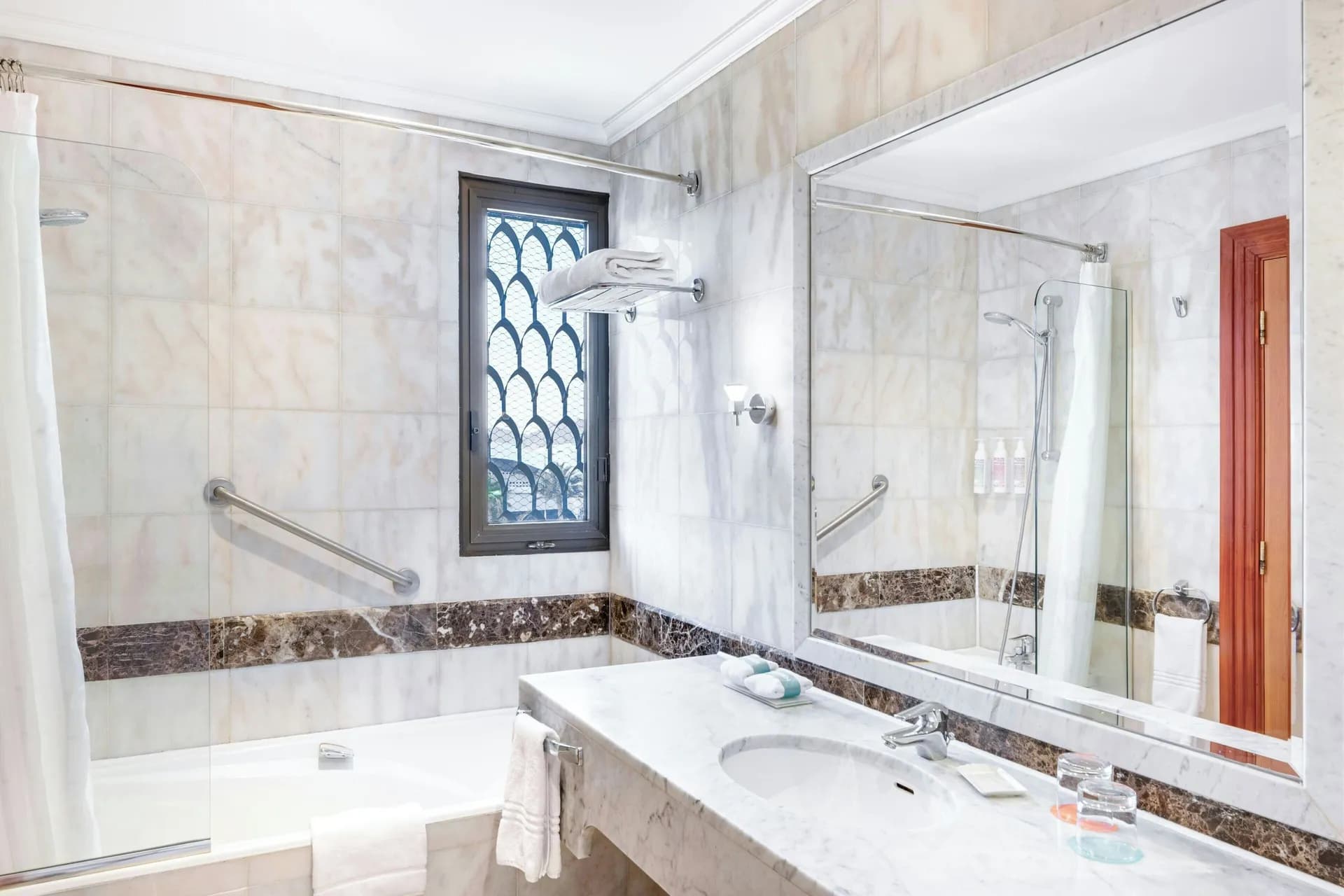 Rainfall showerhead, bathrobes, hair dryer, free toiletries at Le Méridien Medina