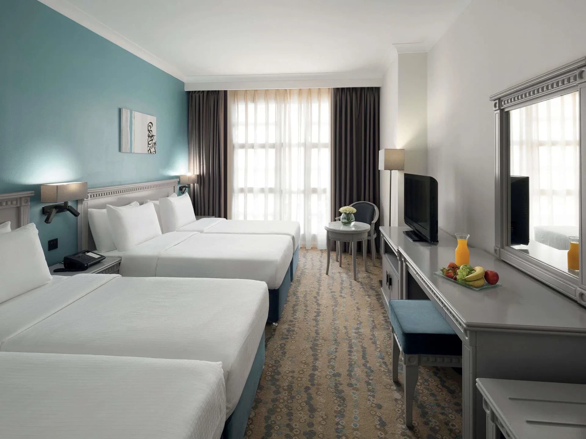 Classic Room Multiple Beds at Anwar Al Madinah Mövenpick Hotel